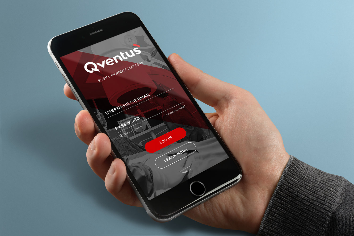 Qventus mobile app login screen on a smartphone