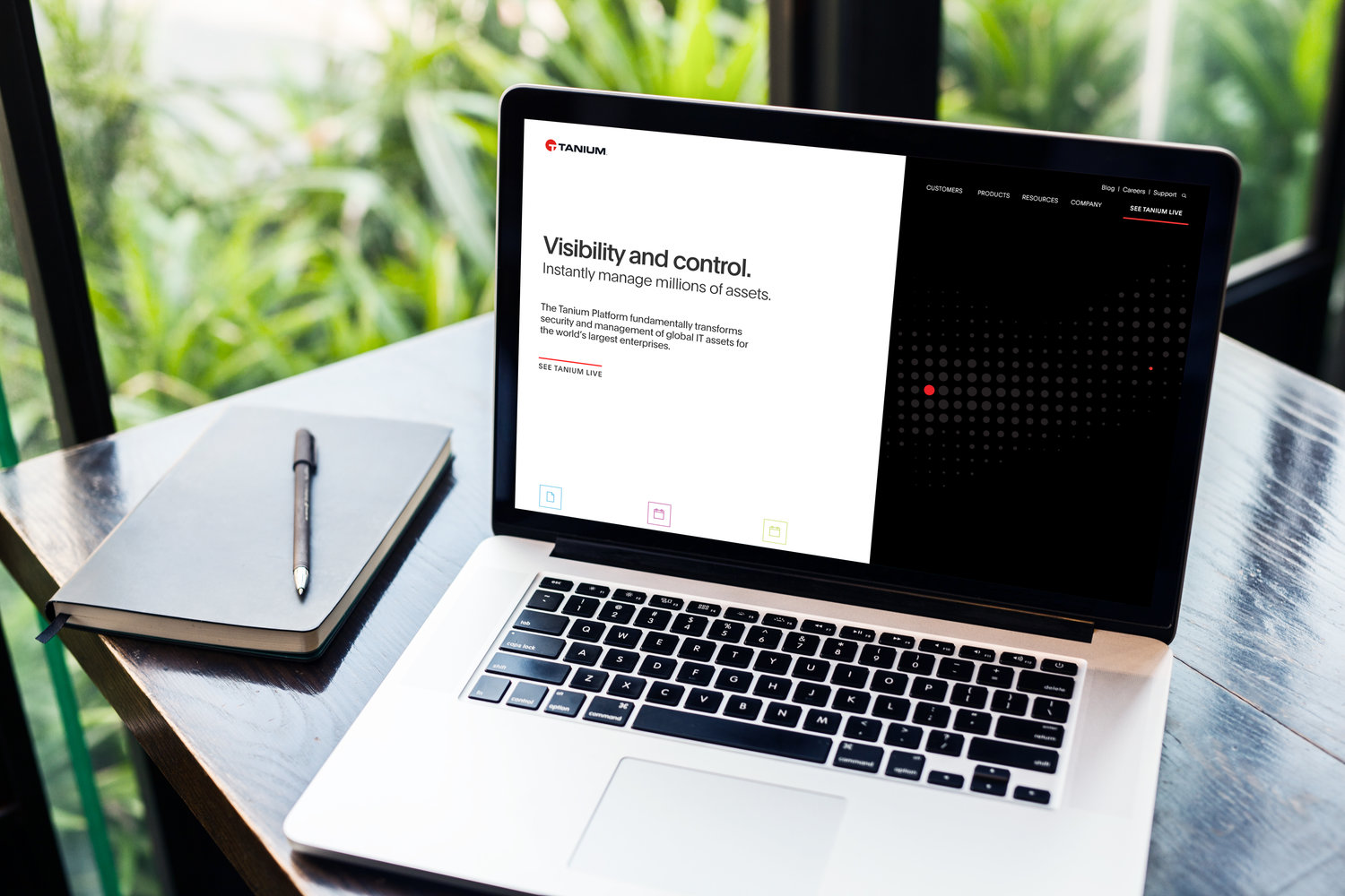 Tanium homepage shown on a laptop